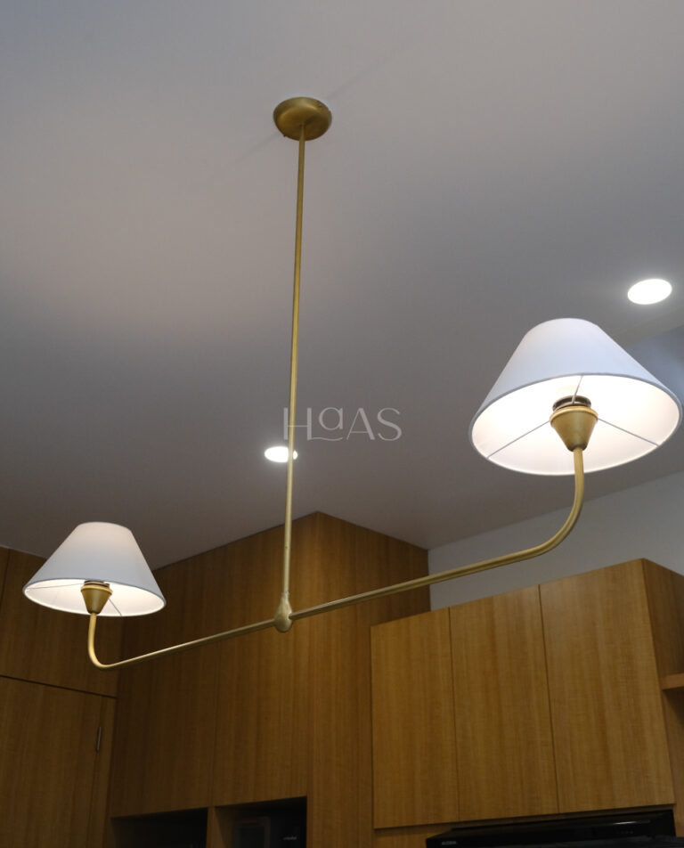 RAVA, handcrafted matte gold brass pendant lamp with two symmetrical shades, Haas Design